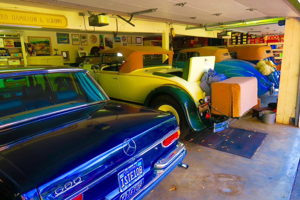 Just an average garage... from left to right a 1967 Mercedes-Benz 600, 1929 Packard straight 8 Roadster, 1936 Packard V12 Convertible Coupe, and a 1936 Packard Super Eight Convertible Sedan!