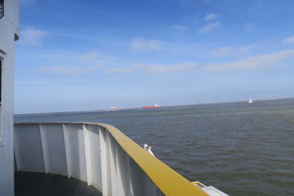 The ships entering Galveston Harbor from the Gulf of Mexico.